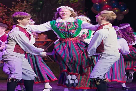 Members of Estonian Dance Ensemble SÕLEKE in traditional Estonian folk costumes at IEFF Vietnam 2026